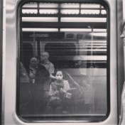 On the train in SeaTac airport, feeling like a normal person going on a trip (besides the wheelchair and mask).